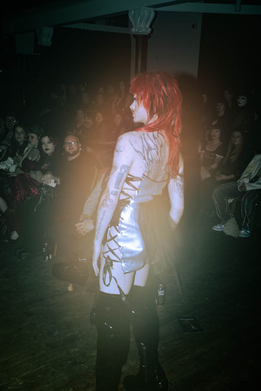 ‘METAL’ tie up sides pleather mini dress