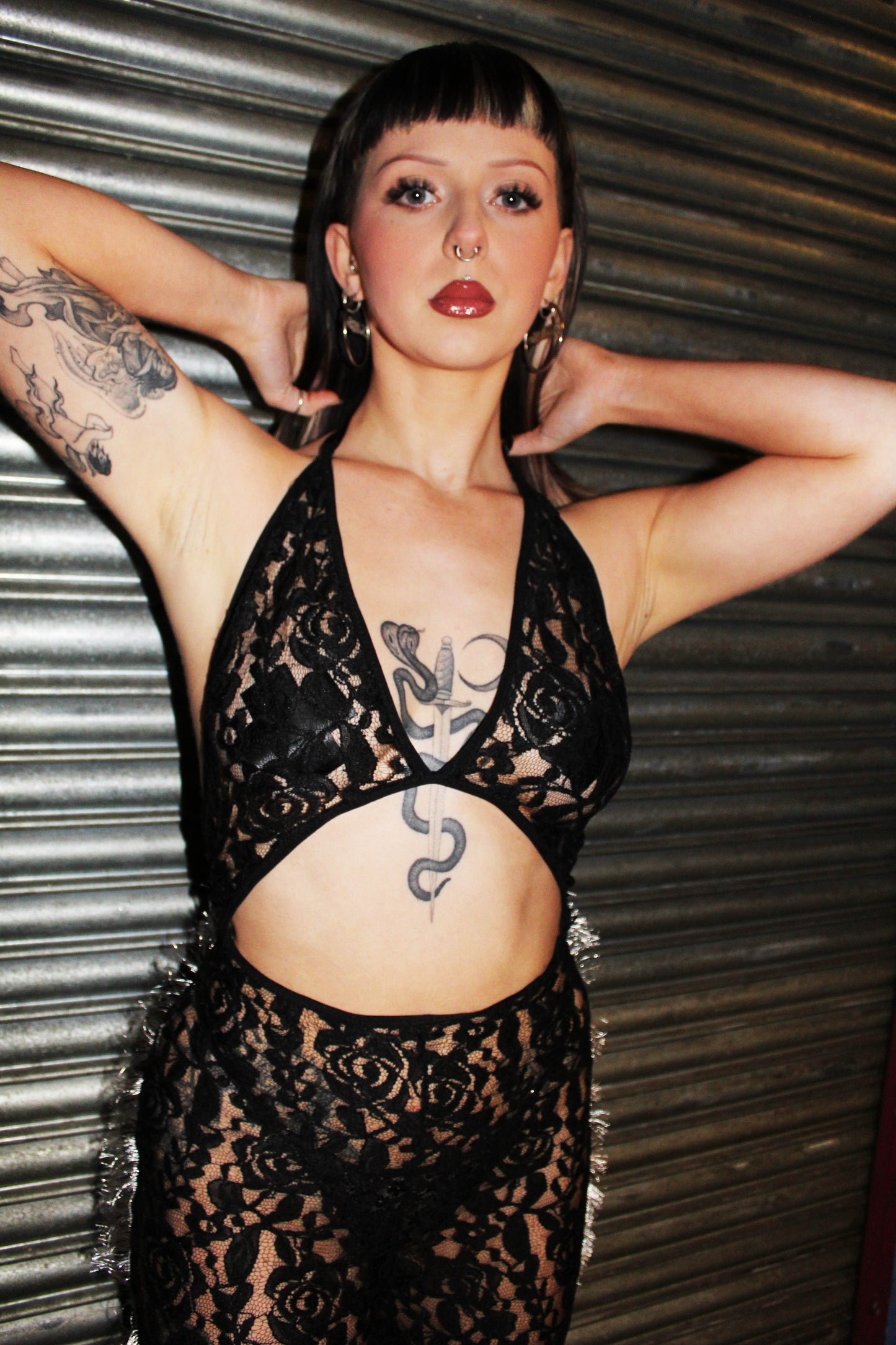 'SCREAM' black lace jumpsuit with fringed flared legs
