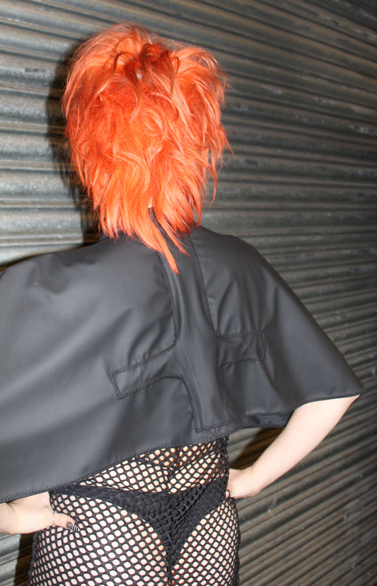 "HEL” BLACK PLEATHER CAPE WITH CRUCIFIX DETAIL