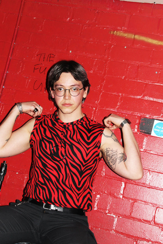 Men’s red zebra tank top with o ring detail