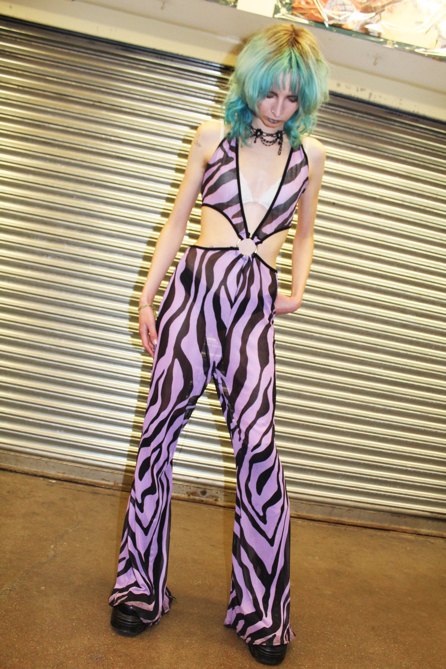 ‘STAY SICK’ purple zebra print mesh flare jumpsuit