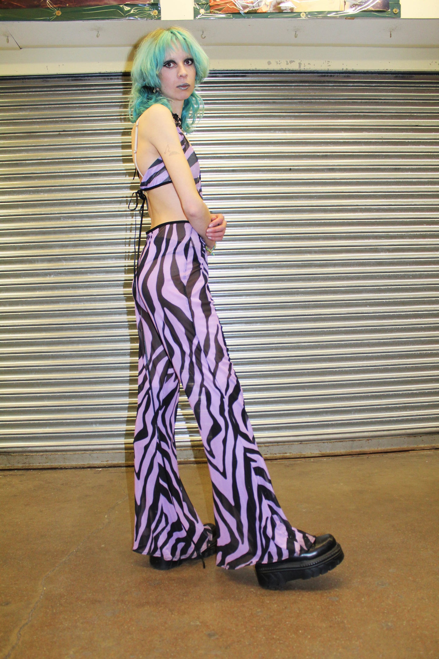 ‘STAY SICK’ purple zebra print mesh flare jumpsuit