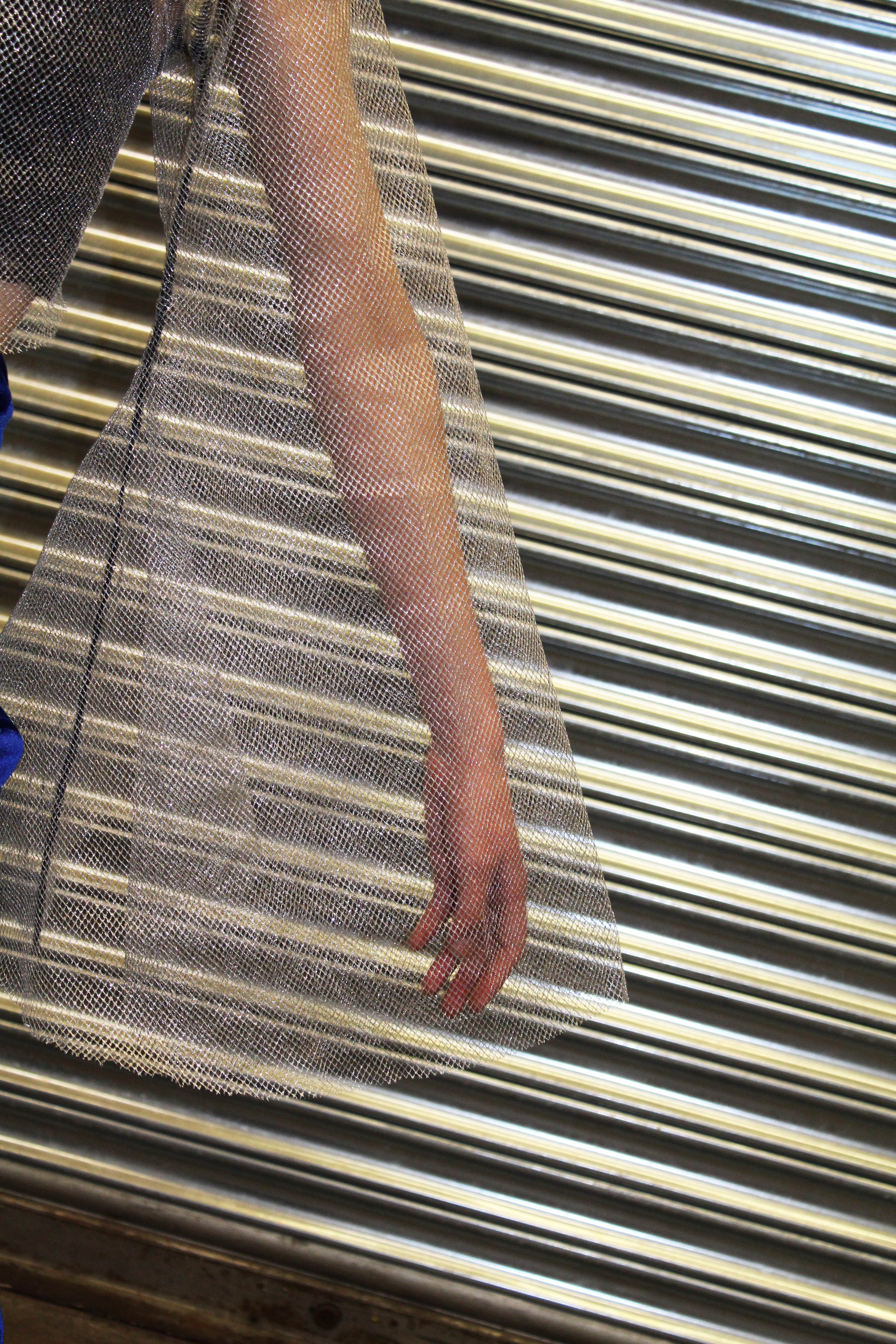 Glitter Ball' silver fishnet crop top with large bell sleeves