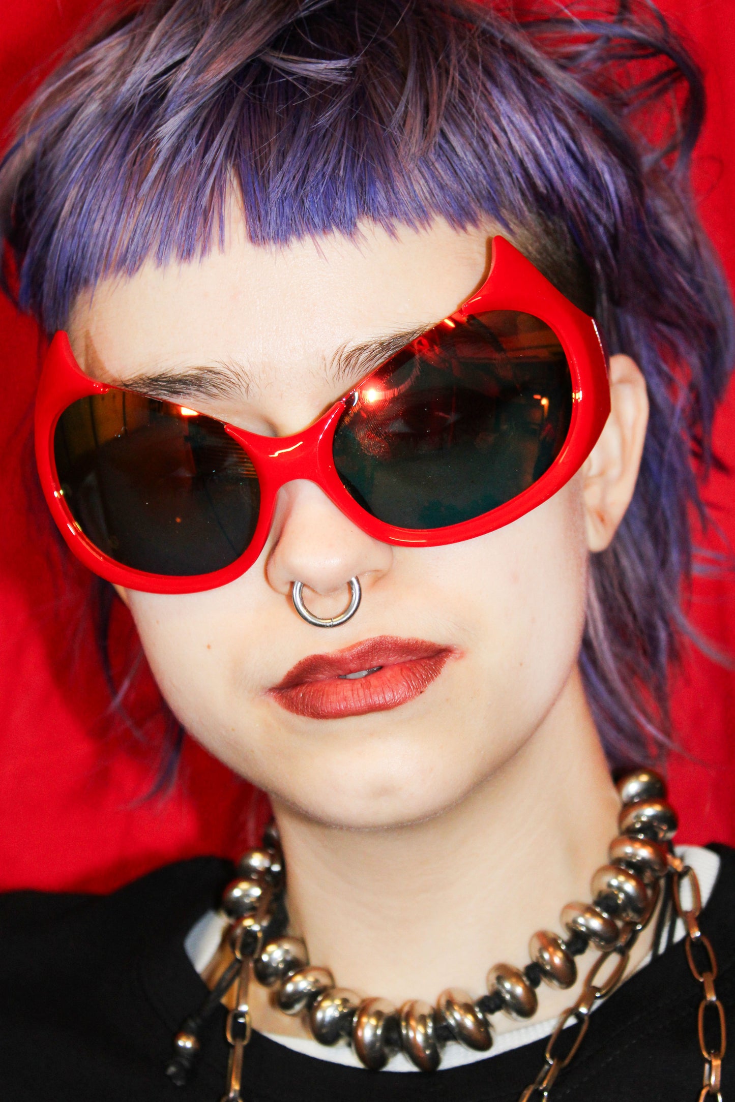 "DEVELISH" RED OVERSIZED SUNGLASSES WITH DEVIL HORNS AND MIRRORED LENSES
