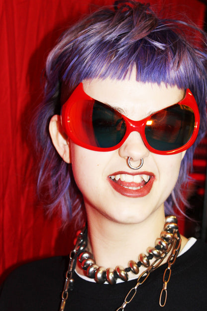 "DEVELISH" RED OVERSIZED SUNGLASSES WITH DEVIL HORNS AND MIRRORED LENSES