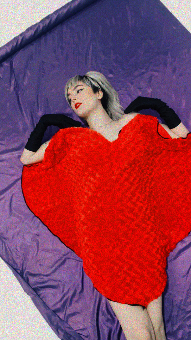 Red faux fur heart shaped rug